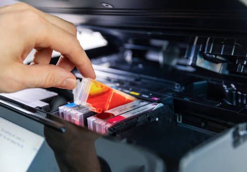 Automatic delivery of ink and toner